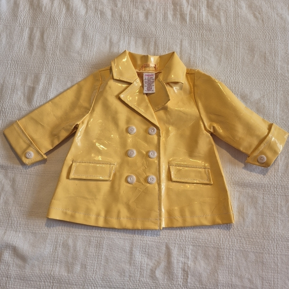 Gymboree girls 6-12 months Sunflower Fields rain coat has some crazing